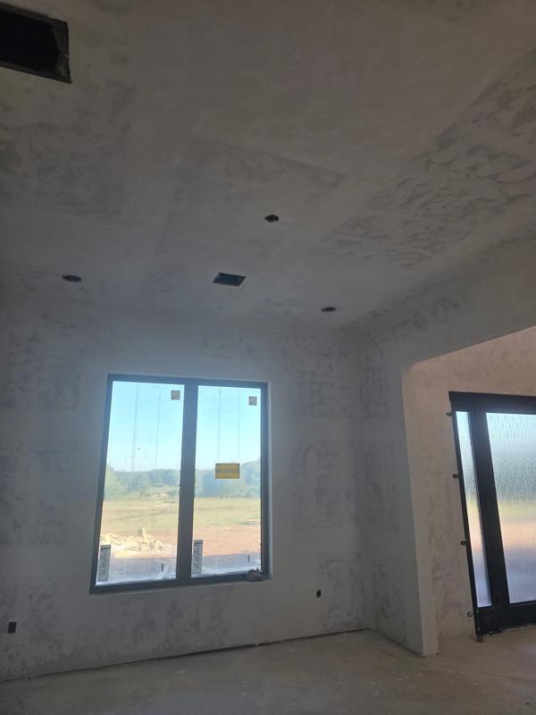 Living area drywall with new windows set